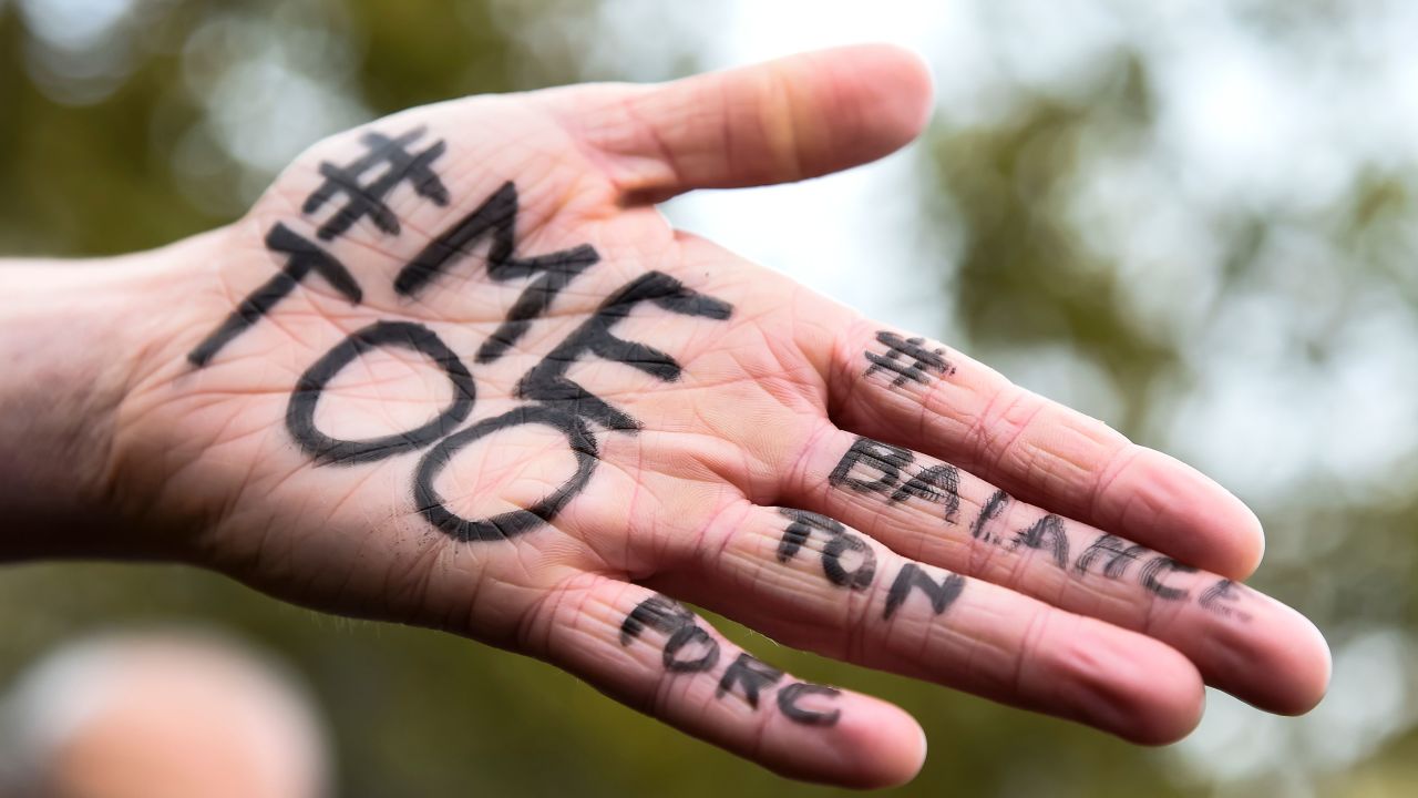 A picture shows the messages "#Me too" and #Balancetonporc ("expose your pig") on the hand of a protester during a gathering against gender-based and sexual violence called by the Effronte-e-s Collective, on the Place de la Republique square in Paris on October 29, 2017.

#MeToo hashtag, is the campaign encouraging women to denounce experiences of sexual abuse that has swept across social media in the wake of the wave of allegations targeting Hollywood producer Harvey Weinstein.
 / AFP PHOTO / BERTRAND GUAY        (Photo credit should read BERTRAND GUAY/AFP/Getty Images)