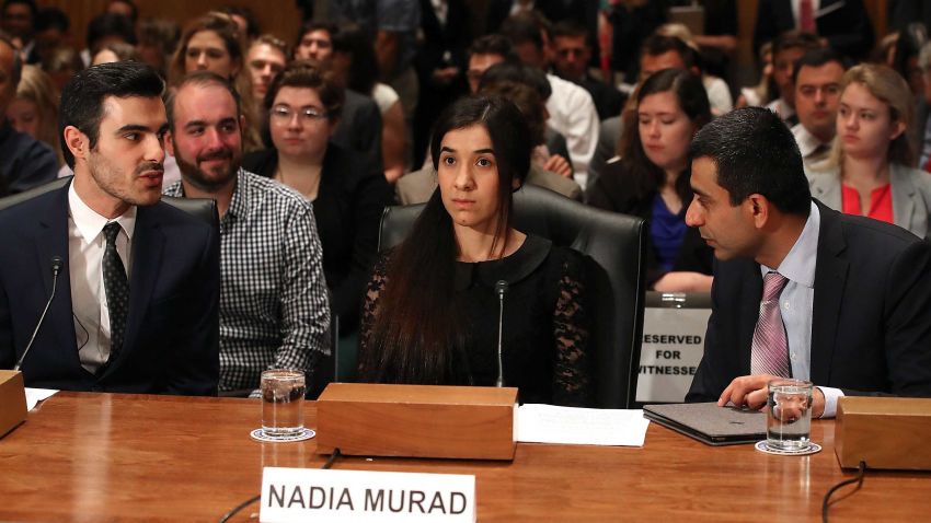 WASHINGTON, DC - JUNE 21:  Nadia Murad, (C), human rights activist, testifies during Senate Homeland Security and Governmental Affairs Committee hearing on Capitol Hill, June 21, 2016 in Washington, DC. The committee heard testimony "The Ideology of ISIS," and examining ISIS ideology and how it relates to the most recent terror attack in Orlando. Also seated is Subhi Nahas (left), chairman of the board of the Spectra Project. (Photo by Mark Wilson/Getty Images)