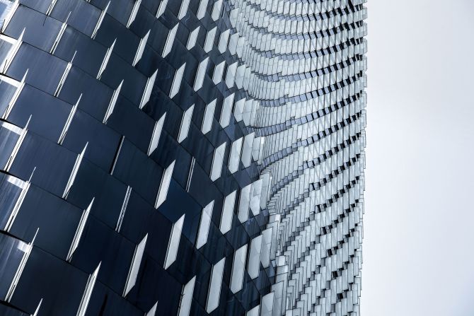 Chinese photographaer He Zhenuan's image shows a kinetic pattern on the Bank of China Tower in Ningbo, China designed by Skidmore, Owings & Merrill LLP. 