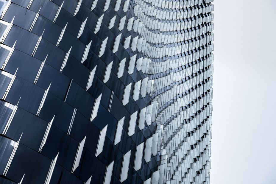 Chinese photographaer He Zhenuan's image shows a kinetic pattern on the Bank of China Tower in Ningbo, China designed by Skidmore, Owings & Merrill LLP. 