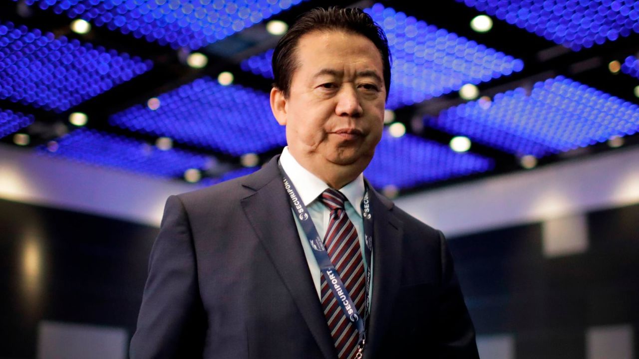 Interpol President, Meng Hongwei, walks towards the stage to deliver his opening address at the Interpol World congress on Tuesday, July 4, 2017, in Singapore. (AP Photo/Wong Maye-E)