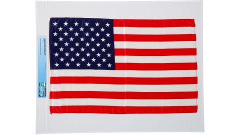 A 5.75" x 4.25" silk flag with clear nylon border stitching that was carried to the moon and back aboard the Apollo Command Module Columbia, July 16-24, 1969, by Neil Armstrong. Credit: Heritage Auctions