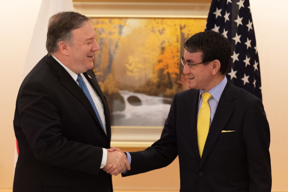 US Secretary of State Mike Pompeo shakes hands with Japan's Foreign Minister Taro Kono at the Prime Minister's office in Tokyo on Saturday, October 6.