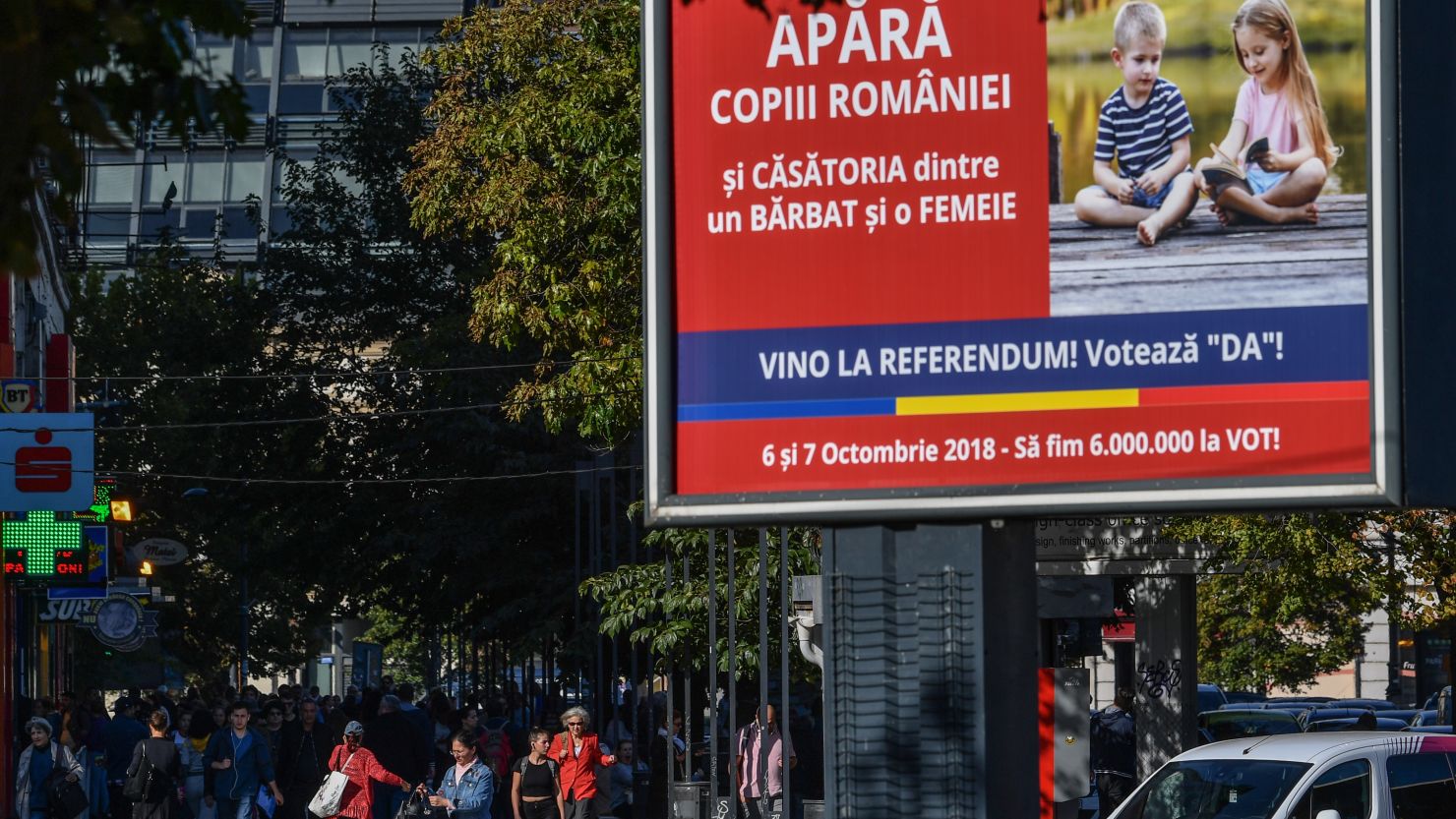 A poster reading "Defend the children of Romania and the marriage between a man and a woman, come to the referendum and say 'YES'" is pictured in the capital, Bucharest, on October 2.