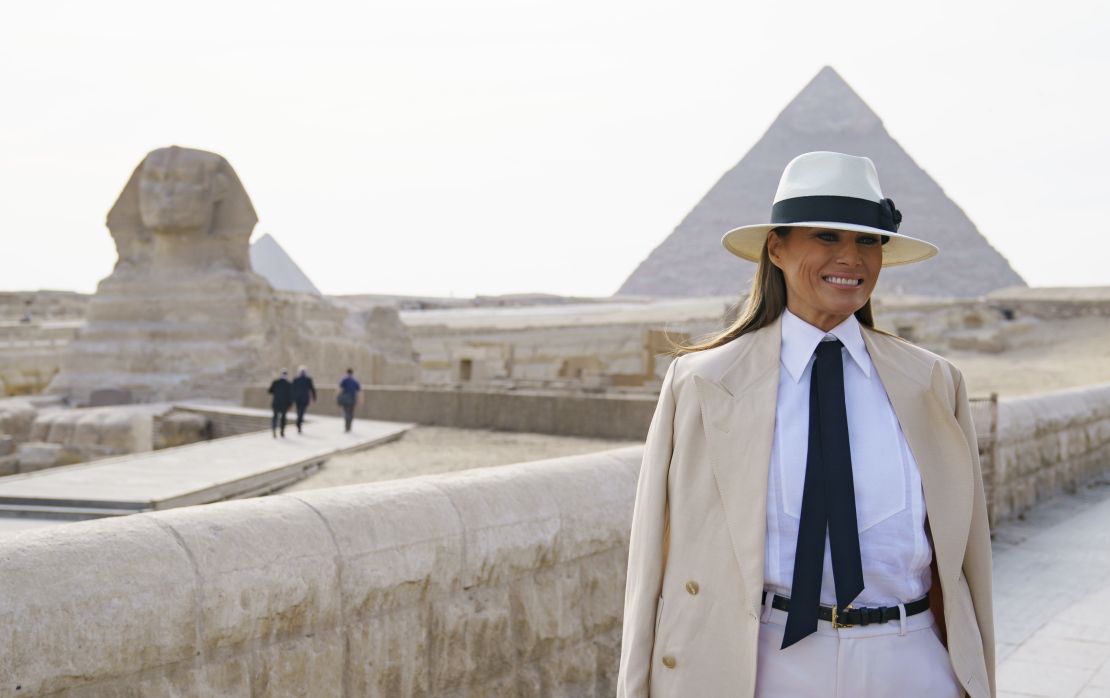 First lady Melania Trump visits the ancient statue of Sphinx, with the body of a lion and a human head, at the historic site of Giza Pyramids in Giza, near Cairo, Egypt, Saturday, Oct. 6, 2018. (AP Photo/Carolyn Kaster)