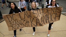 WASHINGTON, DC - OCTOBER 06: Demonstrators from Washington-area law schools -- including Georgetown, George Washington, Howard, The District of Columbia and Catholic universities -- march on the U.S. Capitol East Lawn to protest against the confirmation of Supreme Court nominee Judge Brett Kavanaugh October 06, 2018 in Washington, DC. The Senate is scheduled to vote on Kavanaugh's confirmation later in the day. (Photo by Chip Somodevilla/Getty Images)