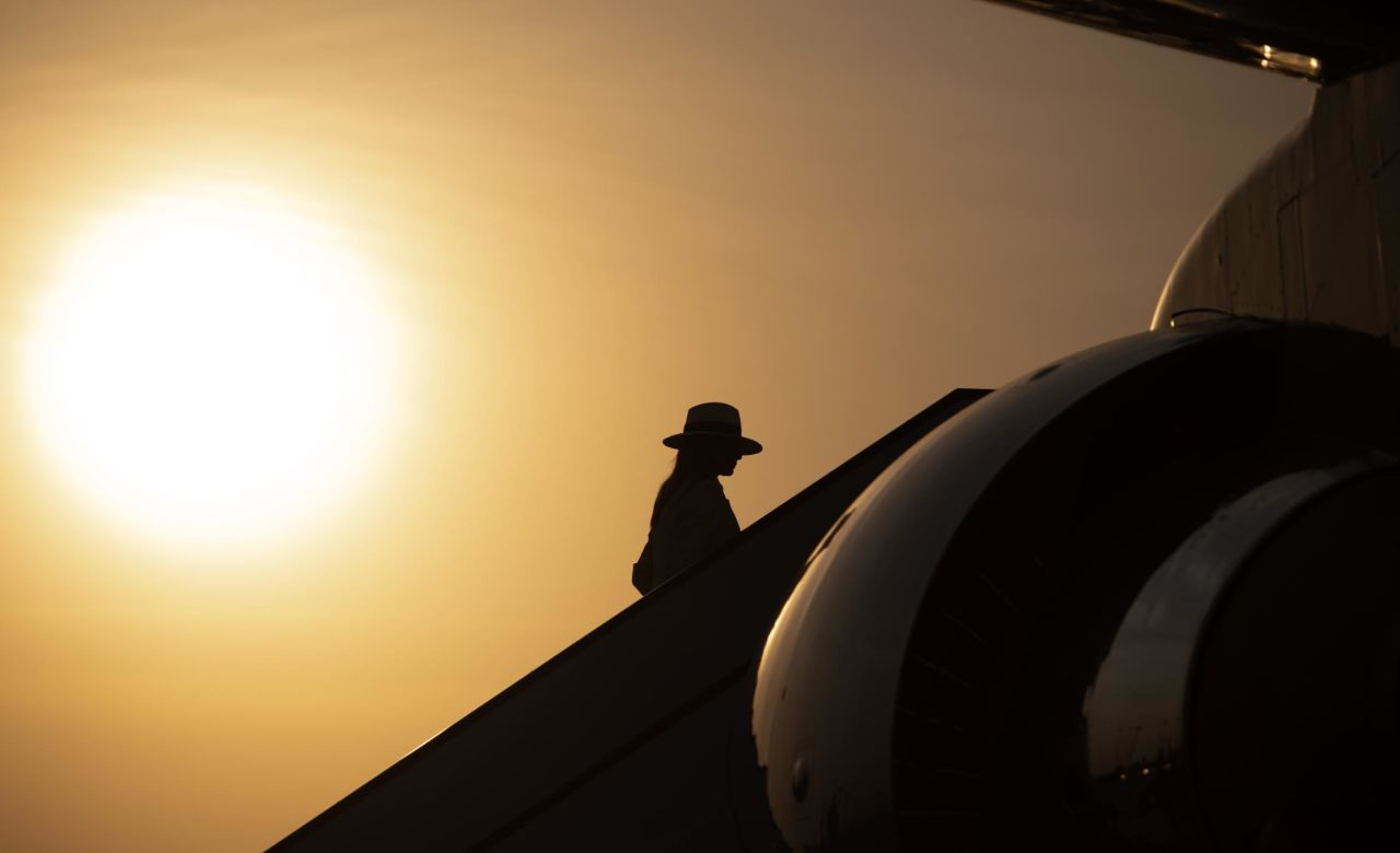 First Lady Melania Trump boards her military plane at Cairo International Airport, following the final stop of her week-long trip to four countries in Africa.