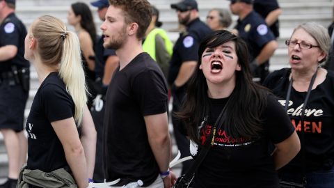 A protester screams while being arrested Saturday at the US Capitol.