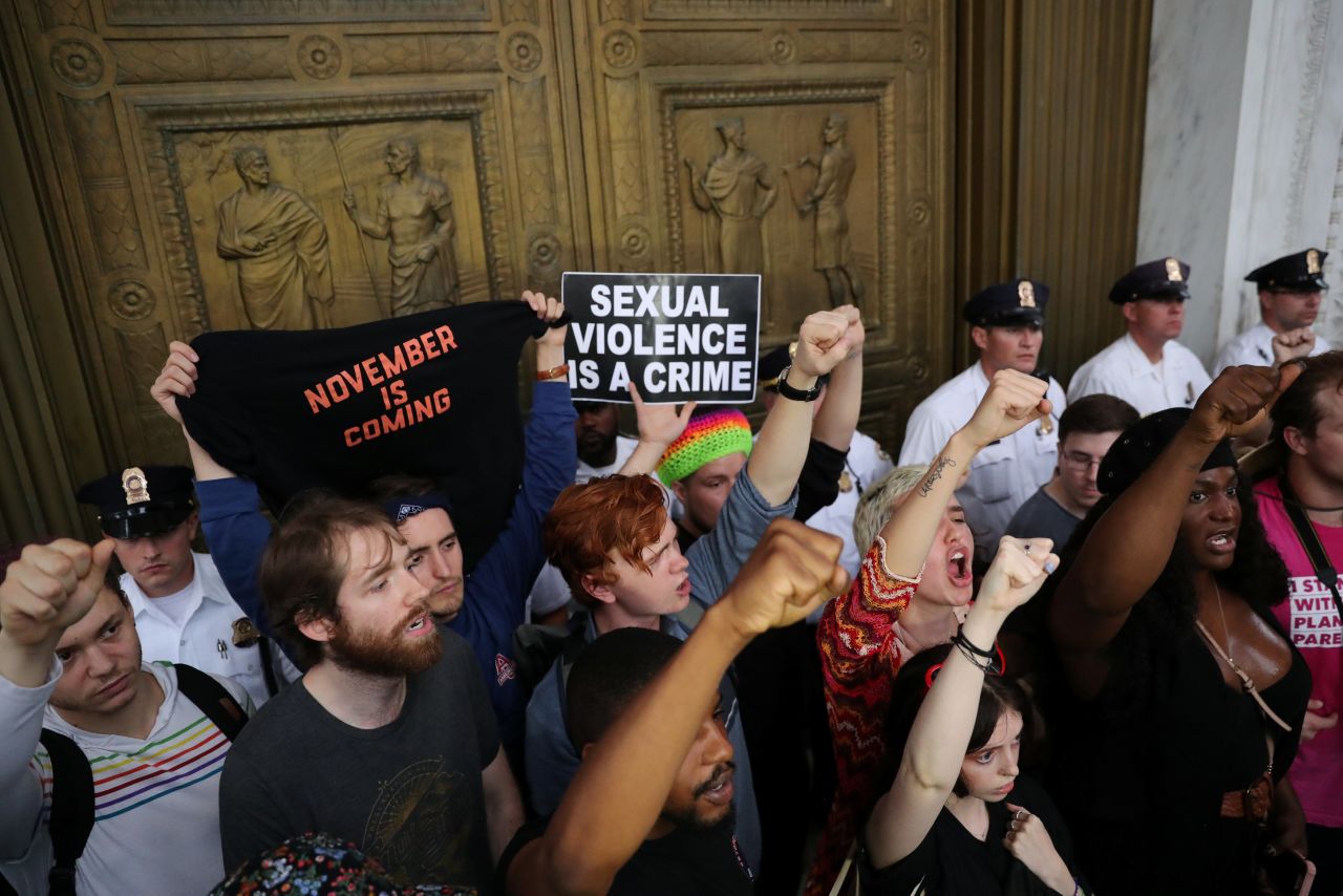 In photos: Protesters rally against Supreme Court nominee Brett
