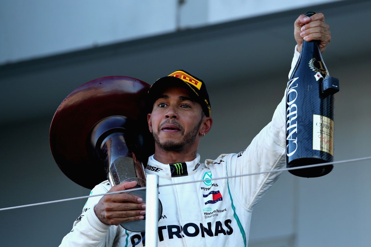 Race winner Lewis Hamilton had plenty to celebrate after claiming victory in the Japanese GP at Suzuka to lead the world championship by 67 points with four rounds remaining. 