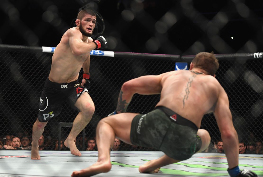 Nurmagomedovchases down McGregor of Ireland in their UFC lightweight championship bout.
