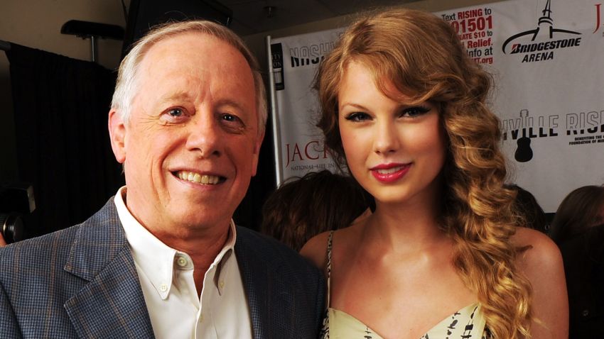 Governor of Tennessee Phil Bredesen (L) and musician Taylor Swift attend Nashville Rising, a benefit concert for flood relief at Bridgestone Arena on June 22, 2010 in Nashville, Tennessee.  (Photo by Rick Diamond/Nashville Rising/Getty Images for Nashville Rising)