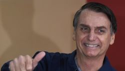 Brazil's right-wing presidential candidate for the Social Liberal Party (PSL) Jair Bolsonaro gives his thumb up after casting his vote during the general elections, in Rio de Janeiro, Brazil, on October 7, 2018. - Polling stations opened in Brazil on Sunday for the most divisive presidential election in the country in years, with far-right lawmaker Jair Bolsonaro the clear favorite in the first round. About 147 million voters are eligible to cast ballots and choose who will rule the world's eighth biggest economy. New federal and state legislatures will also be elected. (Photo by Mauro PIMENTEL / AFP)        (Photo credit should read MAURO PIMENTEL/AFP/Getty Images)
