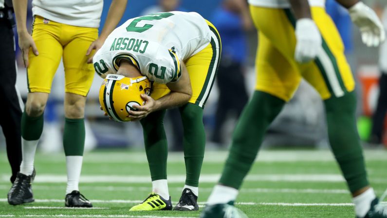 Kicker Mason Crosby of the Green Bay Packers reacts after missing one of three field goal attempts against the Detroit Lions during the first half at Ford Field on October 7, 2018 in Detroit, Michigan. Crosby missed a total of five kicks making him only the fifth kicker in NFL history to miss five kicks in a single game according to ESPN.com's Bill Barnwell.