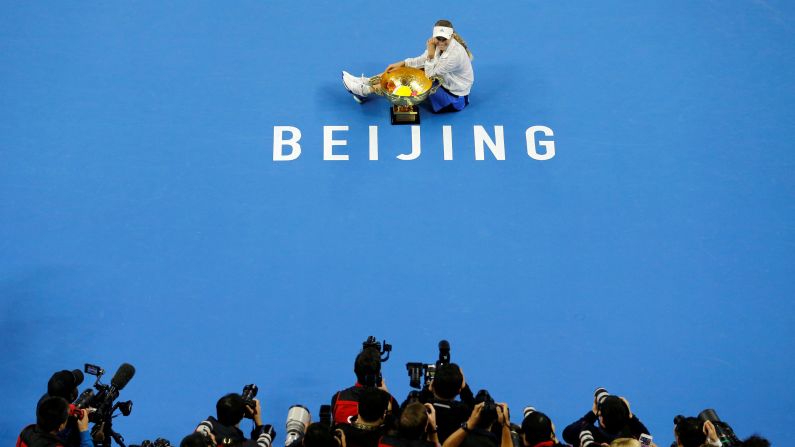 Caroline Wozniacki of Denmark poses with her trophy after defeating Anastasija Sevastova of Latvia during the women's singles finals at the China Open on October 7, 2018.