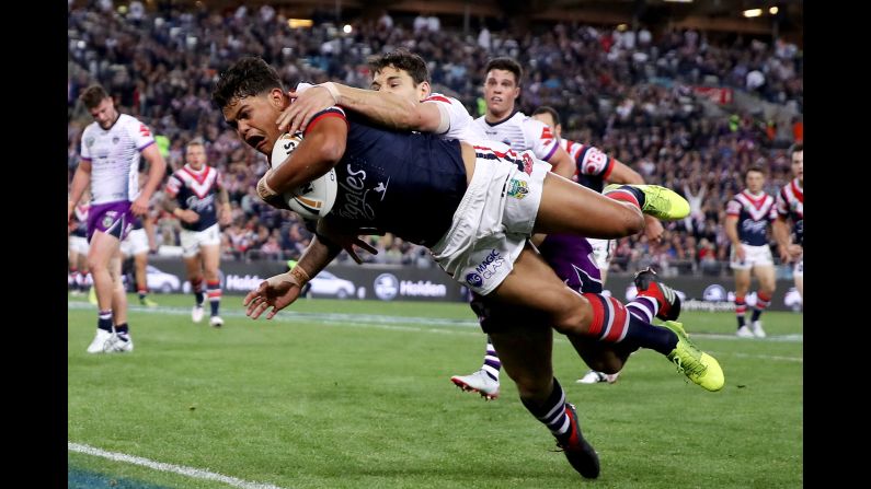 Latrell Mitchell of the Sydney Roosters scores a try during the 2018 NRL Grand Final match between the Melbourne Storm and the Sydney Roosters at ANZ Stadium on September 30, 2018 in Sydney, Australia.