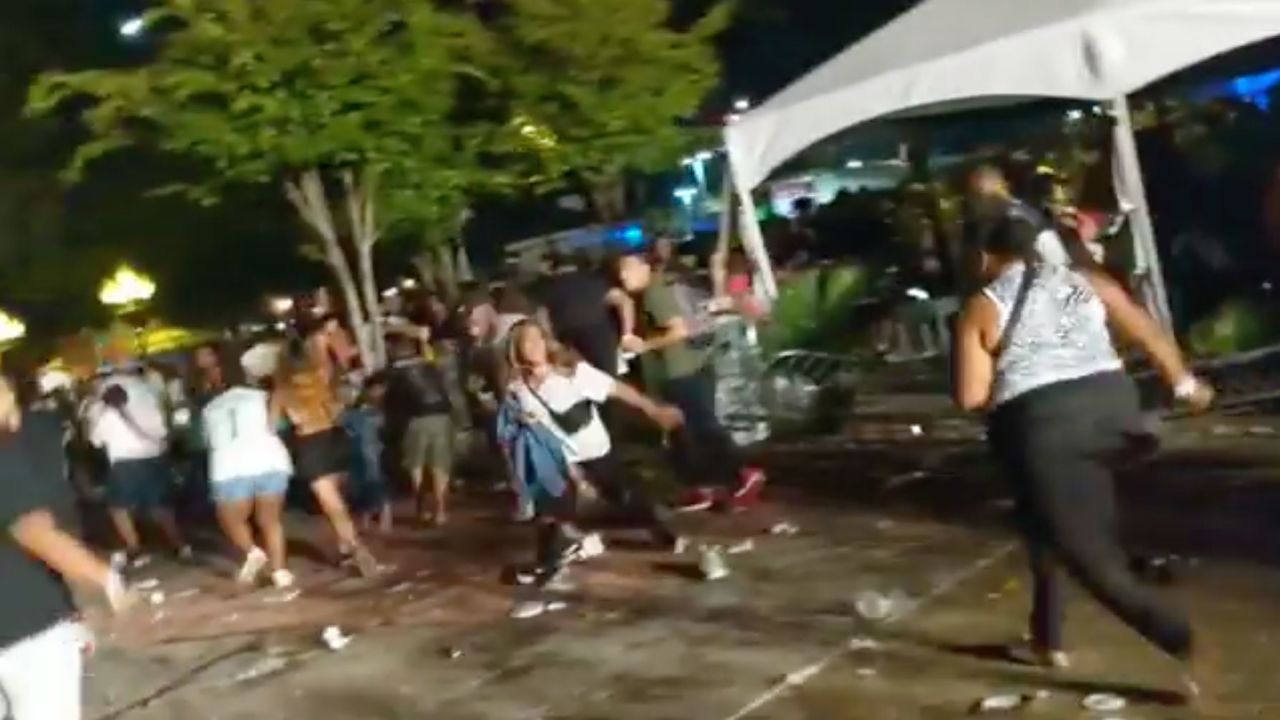 Rap fans flee a Lil Wayne concert in Atlanta.