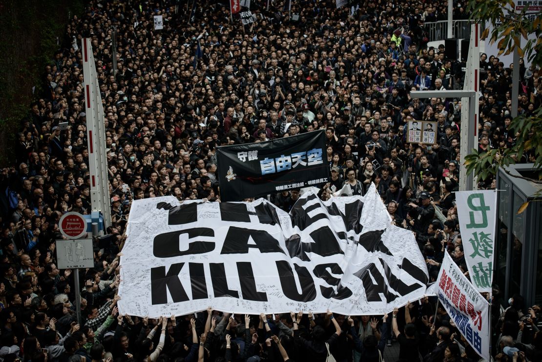 Protesters display a large banner during a rally in March 2014 after attacks on journalists. The city has long had a strong commitment to press freedom.