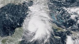 This NOAA/RAMMB satellite image taken on October 8, 2018 at 16:45 UTC shows Hurricane Michael off the US Gulf Coast. - Tropical storm Michael strengthened to a Category 1 hurricane October 8, 2018 as it barreled toward the US Gulf Coast packing maximum sustained winds of 75 miles per hour, meteorologists said. The weather system was located between Mexico's Yucatan peninsula and the west coast of Cuba by 1500 GMT and was heading slowly towards the northern Gulf Coast of Florida, the National Hurricane Center (NHC) in Miami said. (Photo by HO / NOAA/RAMMB / AFP) / RESTRICTED TO EDITORIAL USE - MANDATORY CREDIT "AFP PHOTO / NOAA/RAMMB" - NO MARKETING NO ADVERTISING CAMPAIGNS - DISTRIBUTED AS A SERVICE TO CLIENTSHO/AFP/Getty Images