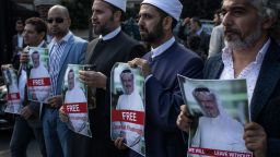 ISTANBUL, TURKEY - OCTOBER 05:  People hold posters of Saudi journalist Jamal Khashoggi during a protest organized by members of the Turkish-Arabic Media Association at the entrance to the Saudi Arabia Consulate on October 5, 2018 in Istanbul, Turkey.  Saudi Consulate officials have said that missing writer and Saudi critic Jamal Khashoggi went missing after leaving the consulate, however the statement directly contradicts other sources including Turkish officials who believe that the writer is still inside and being held by Saudi officials. Jamal Khashoggi a Saudi writer critical of the Kingdom and a contributor to the Washington Post was living in self -imposed exile in the U.S.  (Photo by Chris McGrath/Getty Images)