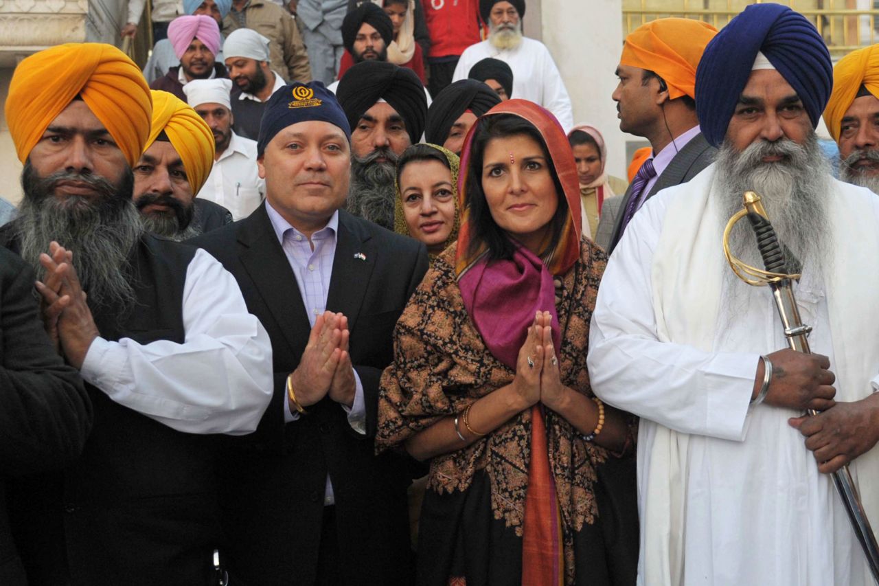 Haley and her husband pose for a photo with Sikh head priest Jaswinder Singh, right, and other officials at the Golden Temple in Amritsar, India, in 2014. Haley was raised in the religion of Sikh but converted to Christianity in her 20s.