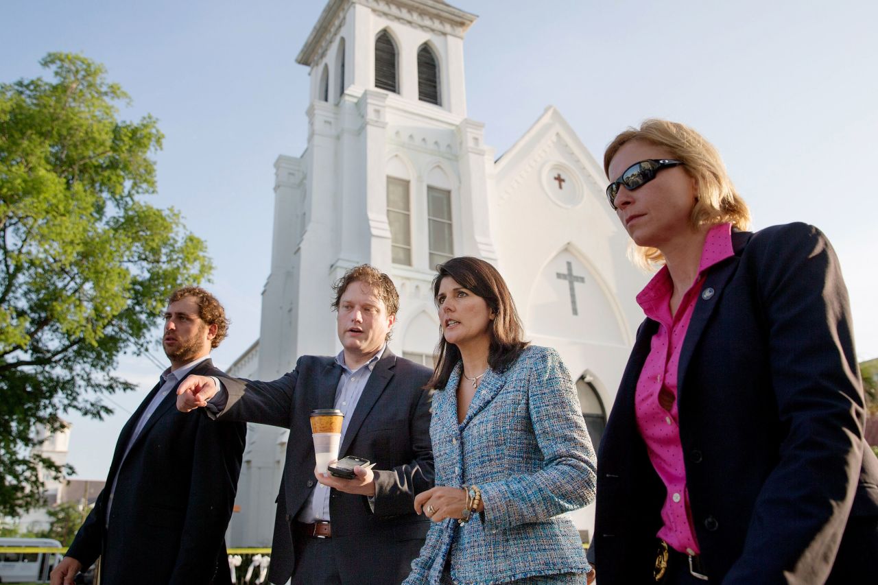 In June 2015, Haley moves from one television interview to another near the Emanuel African Methodist Episcopal Church in Charleston, South Carolina. It was days after the deadly shooting of nine church members. In the aftermath, Haley called for the Confederate battle flag to be removed from the grounds of the South Carolina State House in Columbia. The shooter, Dylann Roof, had been repeatedly photographed with the flag.