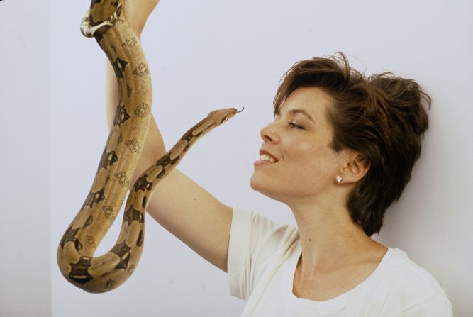 President and CEO of Independent Women's Voice, Heather Richardson Higgins, poses with her pet snake. 