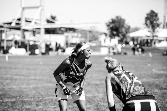 A member of the Denver women's Mile High Club squares off on the line of scrimmage. 