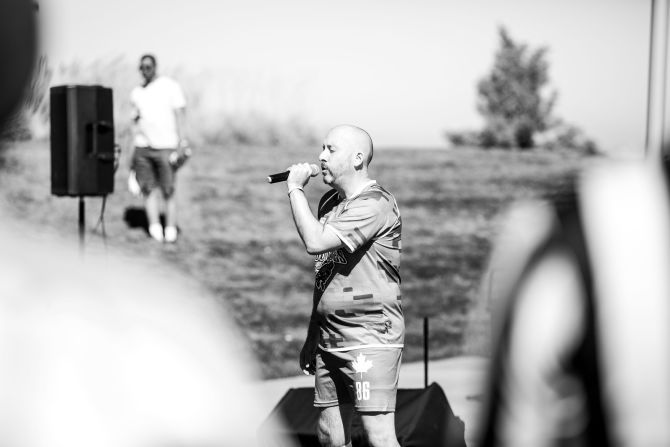 A participant sings Canada's national anthem "O Canada" on the opening morning.