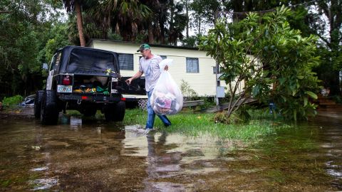 Mitchell Pope tries to salvage what he can from his mobile home Wednesday in St. Marks. 