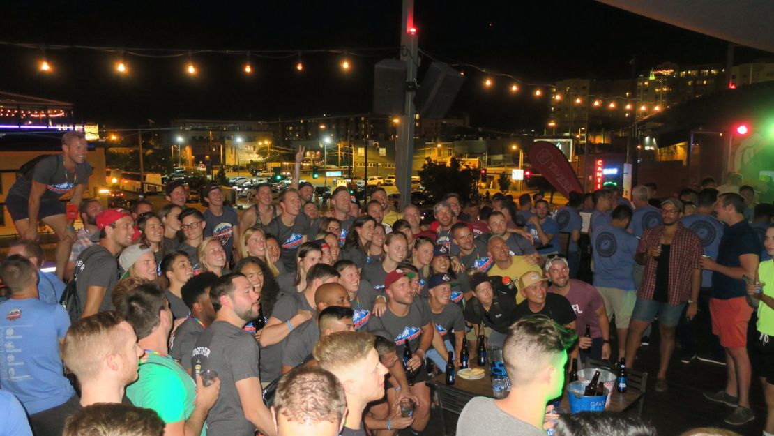 Gay Bowl XVIII athletes congregated at a welcoming party at a rooftop bar in Denver, Colorado. 