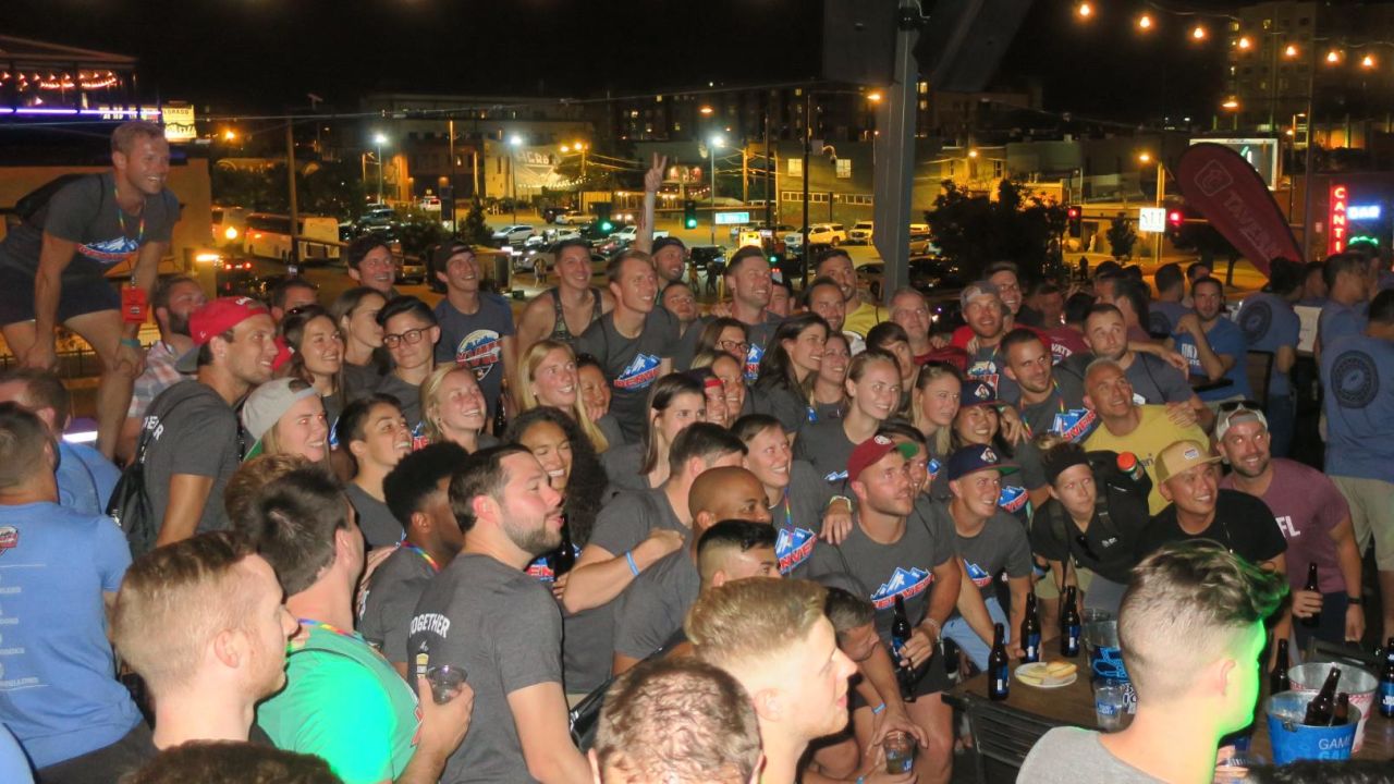 Gay Bowl XVIII athletes congregated at a welcoming party at a rooftop bar in Denver, Colorado. 