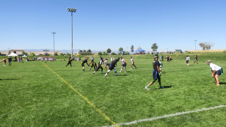 The New York Warriors, featuring former Purdue Boilermaker Dorien Bryant (far right), line up on the left side of the line of scrimmage in their opening game at Gay Bowl XVIII.