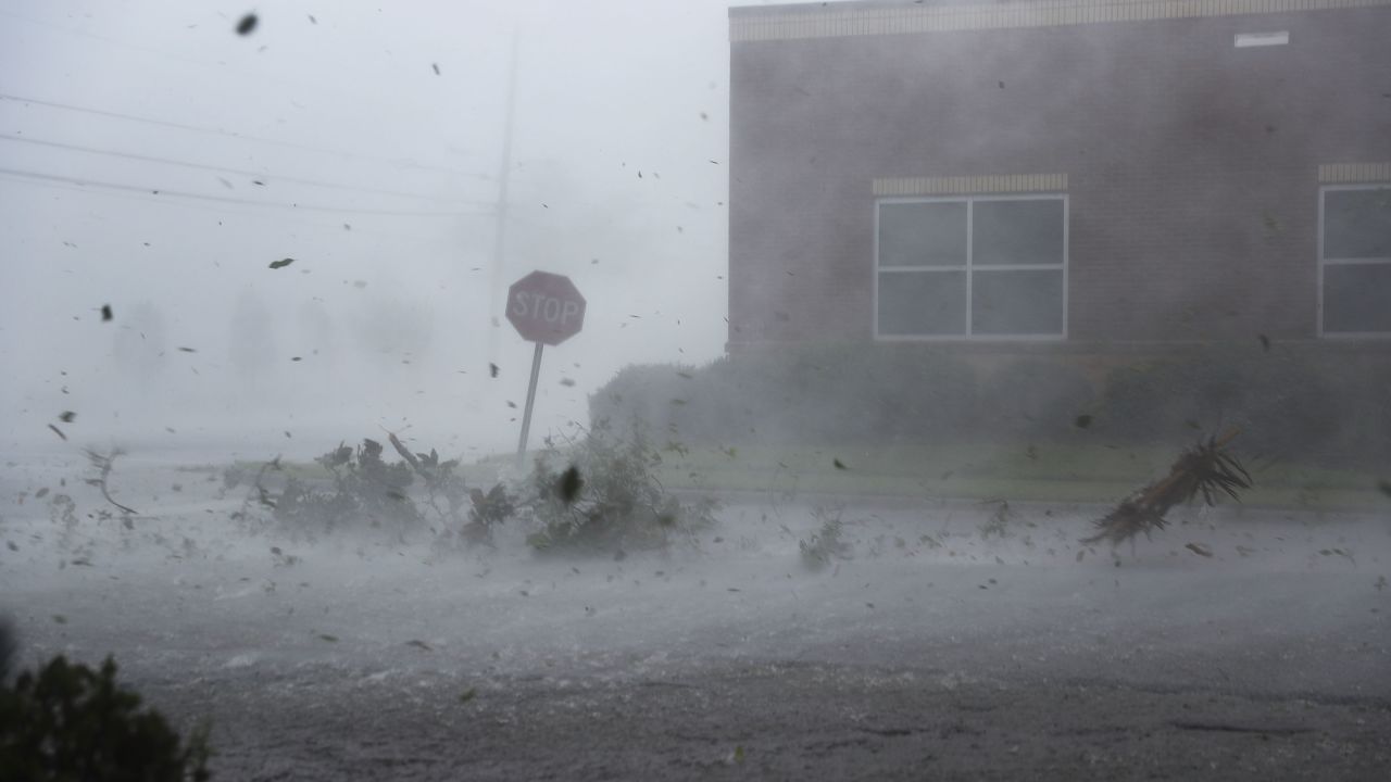 PANAMA CITY, FL - OCTOBER 10:  Debris is blown down a street by Hurricane Michael on October 10, 2018 in Panama City, Florida. The hurricane made landfall on the Florida Panhandle as a category 4 storm.  (Photo by Joe Raedle/Getty Images)
