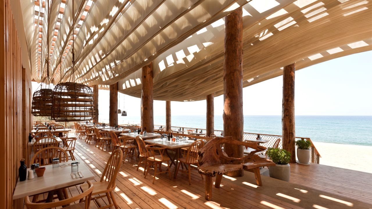 <strong>Natural materials: </strong>The restaurant sits on a wooden platform and is formed from natural wooden columns. The designers hoped that these natural materials would help establish the fusion between sea and land.