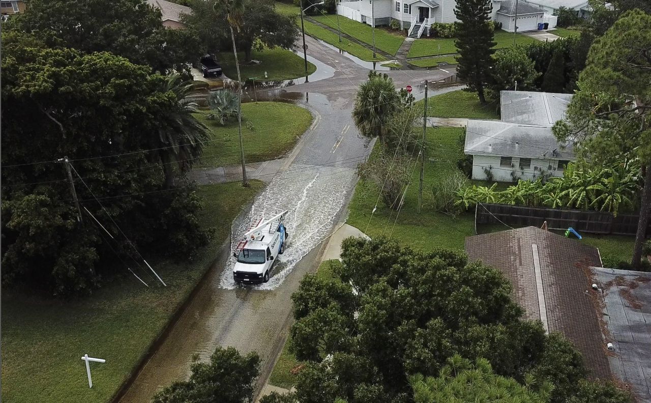 Streets begin to flood as high tide approaches in St. Petersburg, Florida, on October 10.
