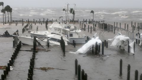 The hurricane damages boats at the Port St. Joe Marina on Wednesday.