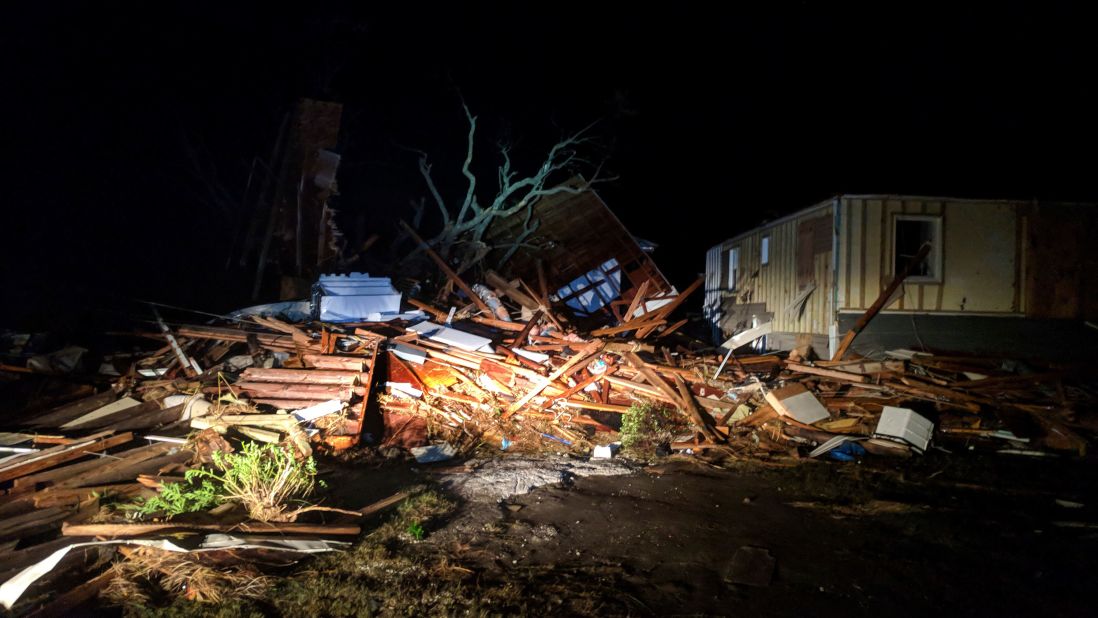 Debris is scattered in Mexico Beach early on October 11.