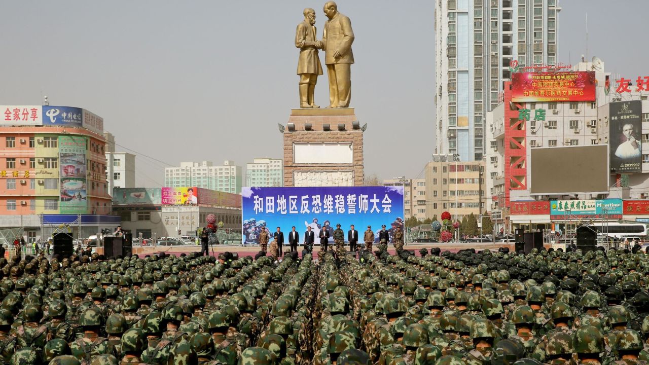 This photo taken on February 27, 2017 shows Chinese military police attending an anti-terrorist oath-taking rally in Hetian, northwest China's Xinjiang Uighur Autonomous Region.