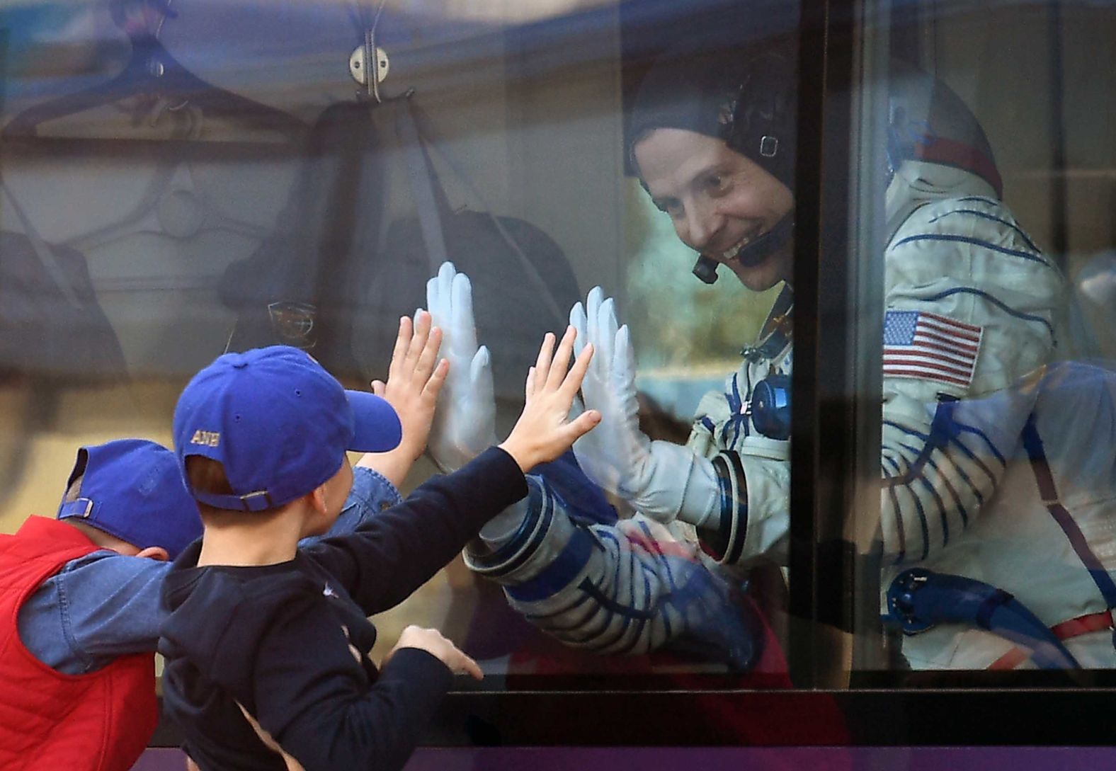 Nick Hague bids farewell during a ceremony ahead of the rocket's departure.