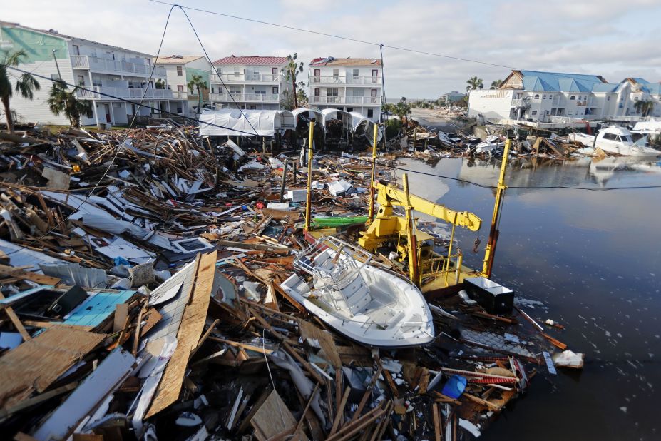 A boat sits amid debris in Mexico Beach on October 11.