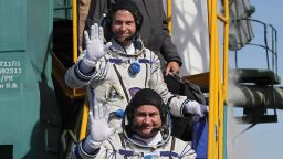 U.S. astronaut Nick Hague, right, and Russian cosmonaut Alexey Ovchinin, crew members of the mission to the International Space Station wave as they board the rocket prior to the launch of Soyuz-FG rocket at the Russian leased Baikonur cosmodrome, Kazakhstan, Thursday, Oct. 11, 2018. (Yuri Kochetkov, Pool Photo via AP)