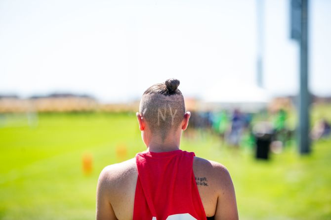 A New Yorker watches from the sidelines, as 57 teams from 22 cities in the US and Canada faced-off.