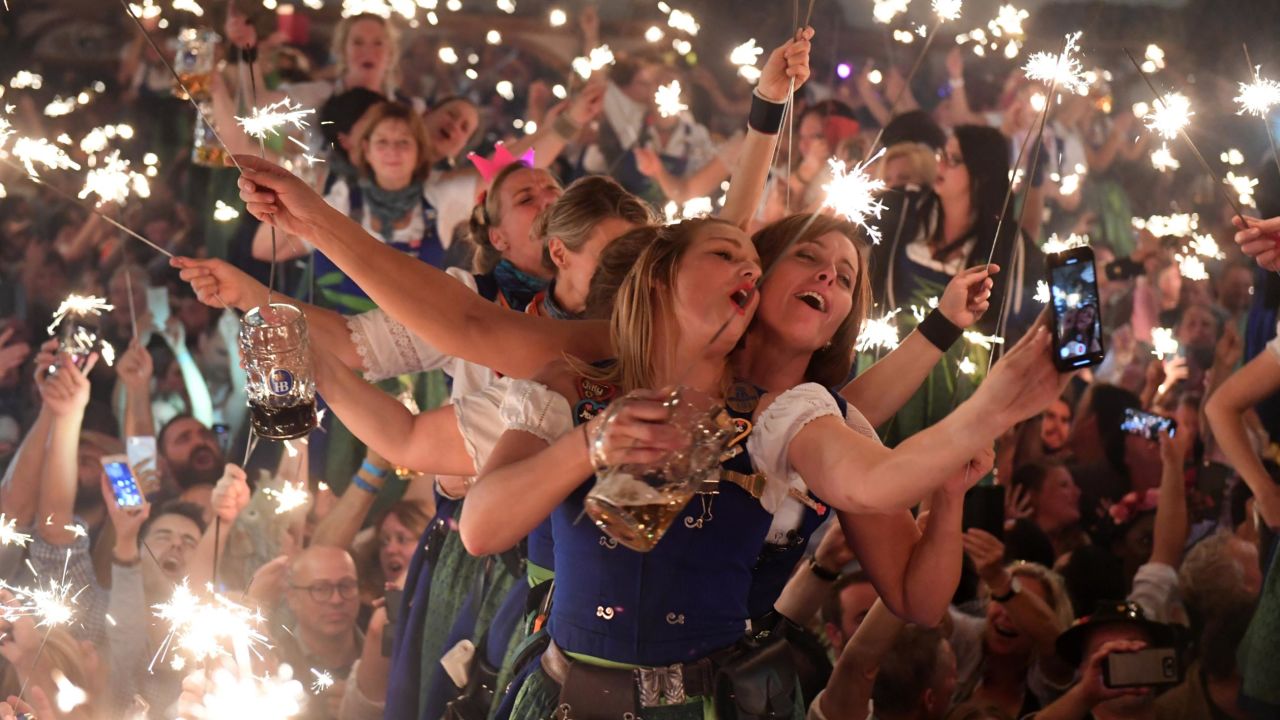 Hostesses dance on tables a beer tent during Octoberfest in 2018.