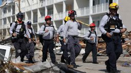 MEXICO BEACH, FL - OCTOBER 11:  Members of the South Florida Search and Rescue team search for survivors in the destruction left after Hurricane Michael passed through the area on October 11, 2018 in Mexico Beach, Florida.  The hurricane hit the panhandle area with category 4 winds causing major damage.  (Photo by Joe Raedle/Getty Images)
