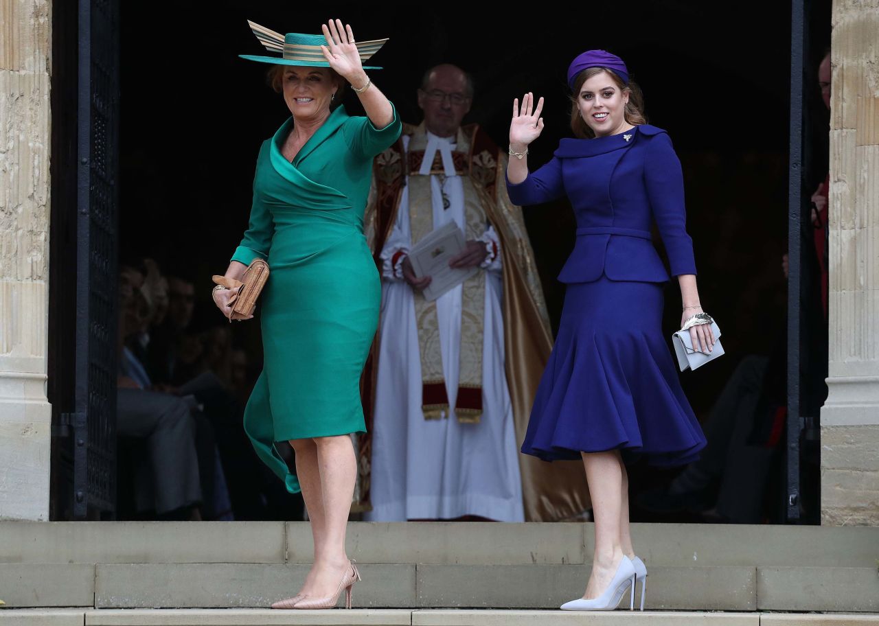 The bride's mother, Sarah, Duchess of York, and Princess Beatrice of York wave from outside St. George's Chapel.