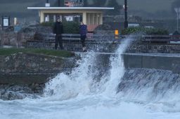 People avoid the waves on Salthill promenade, Co Galway during Storm Callum.