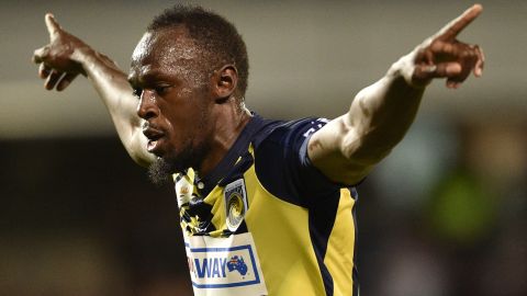 The eight-time Olympic champion celebrates scoring for Australian A-League soccer club Central Coast Mariners in a preseason match.