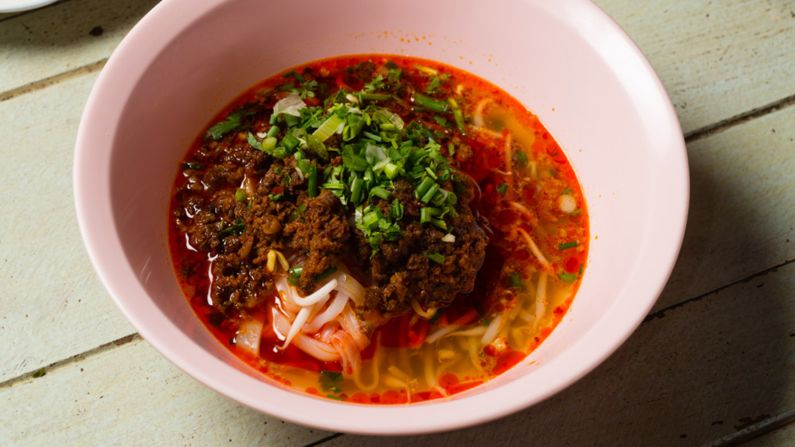 <strong>Khao soi naam naa: </strong>The star of khao soi naam naa is a dollop of paste formed from minced pork belly, fermented soybeans and dried chilies simmered in pork fat. "It's like a savory, umami bomb," Bush says.