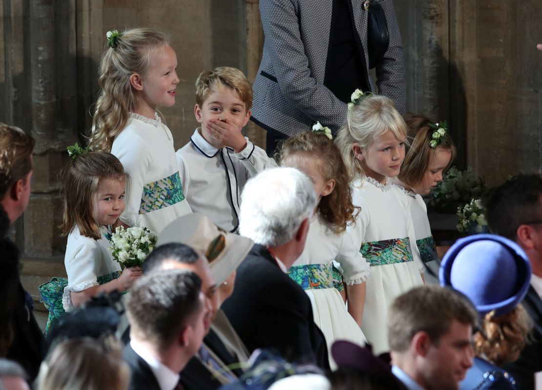The bridesmaids and page boys, inclduing Prince George and Princess Charlotte, arrive for the royal wedding.